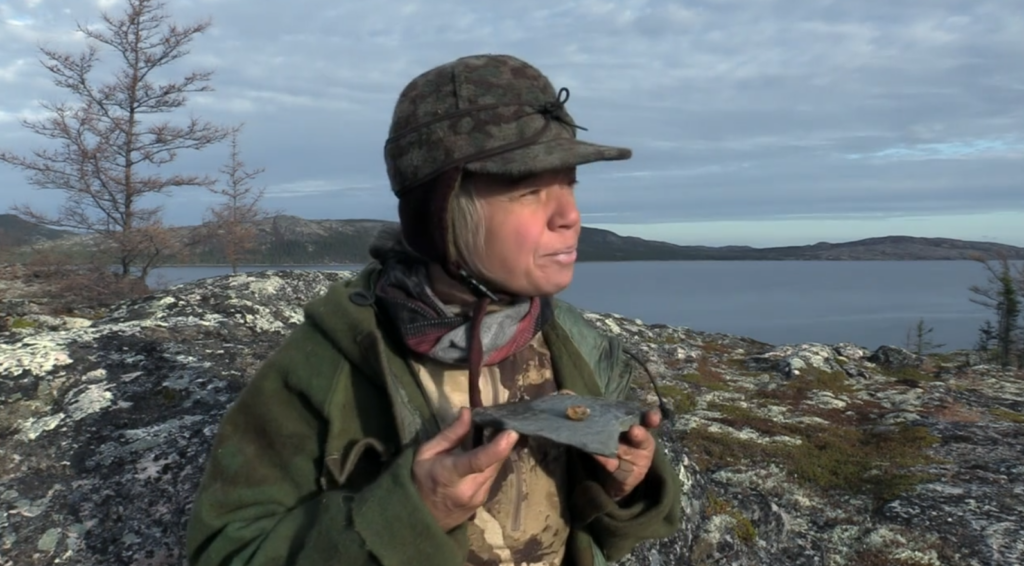 Woniya Thibeault (@buckskin_revolution) wears a Stormy Kromer Cap while filming during her time on the show Alone.