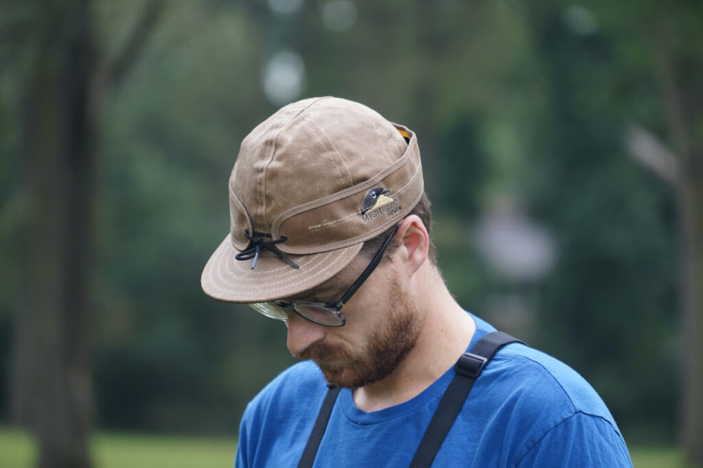 A member of the Michigan Audubon shows off his Michigan Audubon Stormy Kromer waxed cotton cap